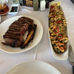 Rib Eye Steak  And Calamari