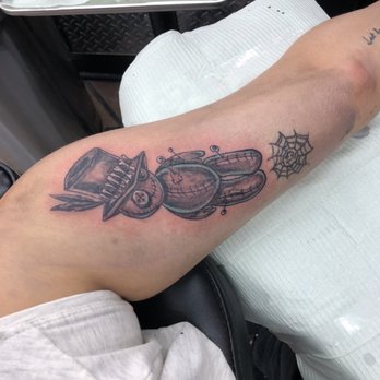 Big Easy Tattoo - Original piece drawn of a voodoo priest doll by Tony - Tattoo Near Me - New Orleans, Louisiana