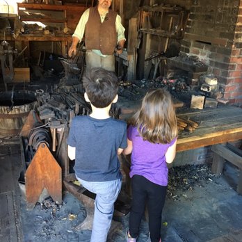 Old Cowtown Museum - Talented blacksmith making iron roses. - Museums Near Me - Wichita, Kansas Old Cowtown Museum - Talented blacksmith making iron roses. - Museums Near Me - Wichita, Kansas