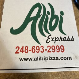 a pizza box on a counter