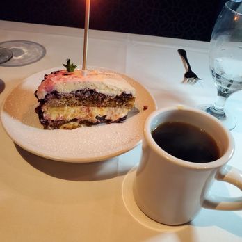Celebrations Restaurant - Anniversary dessert. This blueberry and lemon tiramisu was very unique and extremely delish!! - New American Near Me - Cape Girardeau, Missouri Celebrations Restaurant - Anniversary dessert. This blueberry and lemon tiramisu was very unique and extremely delish!! - New American Near Me - Cape Girardeau, Missouri