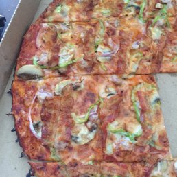 Cold pizza with very little toppings.  Order at your own risk.