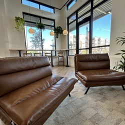 Baristopia coffee - Sofa seating by the electrical fire place