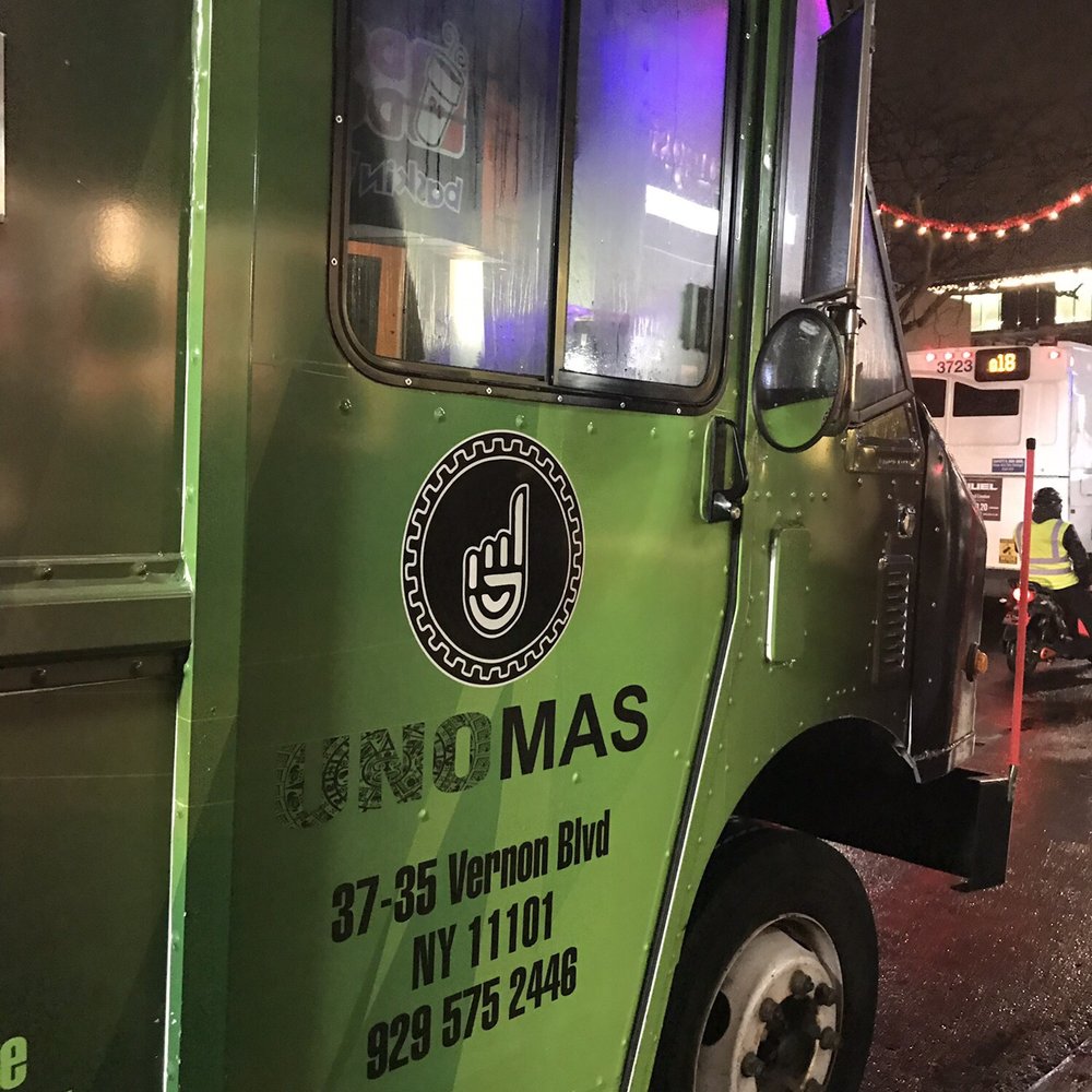 Uno Mas - a green food truck parked on the side of the road - Food Trucks Near Me - Long Island City, New York Uno Mas - a green food truck parked on the side of the road - Food Trucks Near Me - Long Island City, New York
