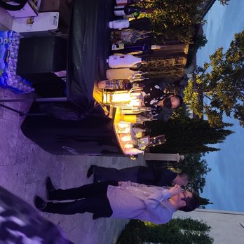 Clutch Mobile Bartending - Bar in the evening. Cute light set up. - Bartenders Near Me Clutch Mobile Bartending - Bar in the evening. Cute light set up. - Bartenders Near Me
