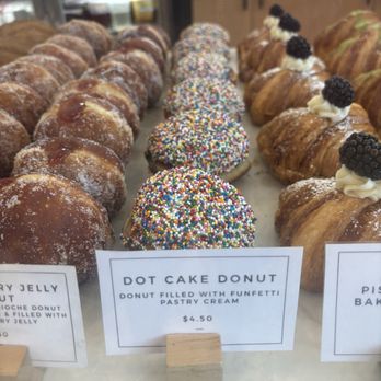 Sunday Morning Bakehouse - Dot cake donut covered in sprinkles , not a fan of the filling - Coffee & Tea Near Me - McLean, Virginia