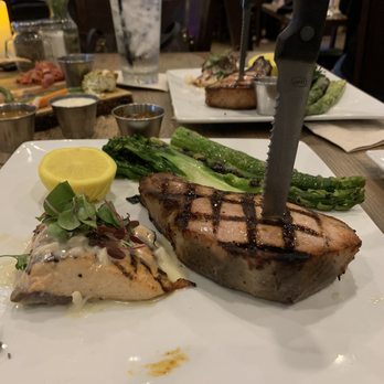 CraftWay Kitchen - Plano - Salmon and pork chop with brocollini and asparagus - New American Near Me - Plano, Texas