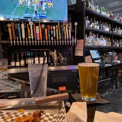 Wicked Cow Burgers and Brews - Bar area, burger almost gone.  Sorry I was hungry.