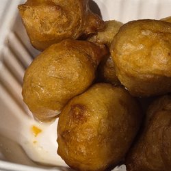 Mei Wei Bistro - The glistening and puddle i n the picture aren't moisture -- it's deep fryer grease.  These are like sponges.  Inedible.