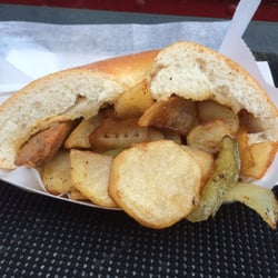 Hot Diggity Dogs - Hot Sausage on pizza roll with peppers and fried potatoes