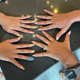 Yellow marble nails on the left cost over $125 and it didn't even last a week. Yellow marble nails on the left cost over $125 and it didn't even last a week.