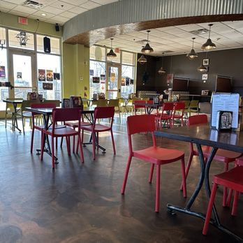 Lovin’ Cup - tables and chairs in a restaurant - Music Venues Near Me - Rochester, New York