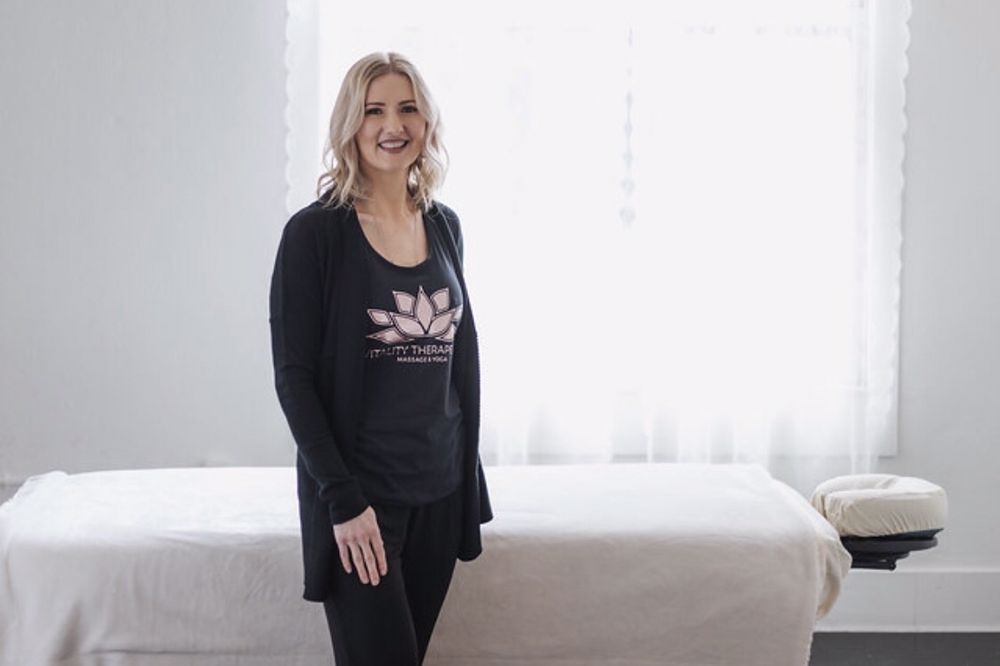 Vitality Therapeutic Massage & Yoga Logo