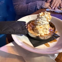 3 ladies split & enjoyed Grannys Skillet Apple Pie $11.00 It was yummy. Served hot & came with a Big dollop of whipped cream on top too! 3 ladies split & enjoyed Grannys Skillet Apple Pie $11.00 It was yummy. Served hot & came with a Big dollop of whipped cream on top too!