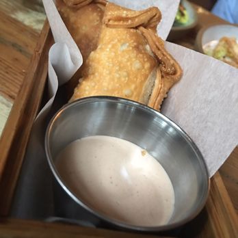Lechon - Brisket empanadas with aioli sauce - Tapas Bars Near Me - Portland, Oregon Lechon - Brisket empanadas with aioli sauce - Tapas Bars Near Me - Portland, Oregon