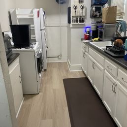 After photo of the kitchen after moving the fridge and stove After photo of the kitchen after moving the fridge and stove