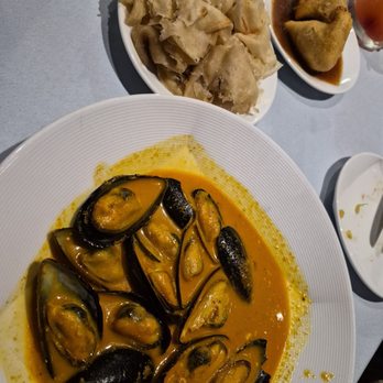 Flambo Restaurant - Mussels and roti - Trinidadian Near Me - Sarasota, Florida Flambo Restaurant - Mussels and roti - Trinidadian Near Me - Sarasota, Florida