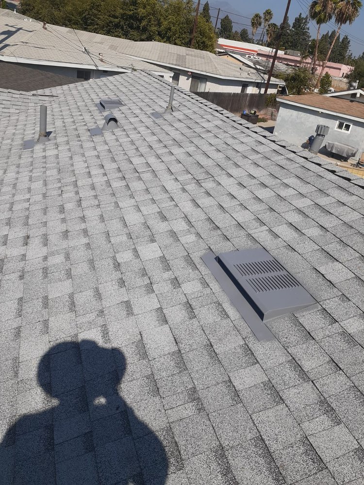 Slide of TopCal Roofing