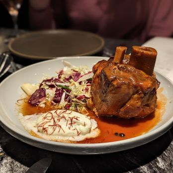 Handle - a plate of food on a table - New American Near Me - Park City, Utah