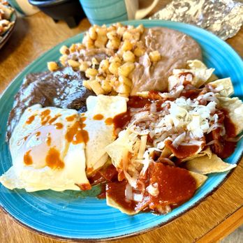 Tita's Mexican Kitchen - Bistec with eggs, chilaquiles, refried beans and potatoes. (Tita's Breakfast) - Mexican Near Me - Big Spring, Texas