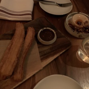 Oloroso - Dessert - Left - Churro Right - Soy, Nutty, Red Wine reduction sauce ( looks like a flan honestly) - Spanish Near Me - Philadelphia, Pennsylvania Oloroso - Dessert - Left - Churro Right - Soy, Nutty, Red Wine reduction sauce ( looks like a flan honestly) - Spanish Near Me - Philadelphia, Pennsylvania