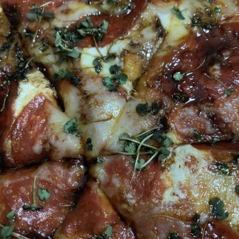 Troppo - That's not basil, it's alfalfa sprouts on margarita pizza. Someone messed up! - New American Near Me - Lansing, Michigan
