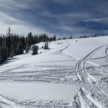 Grand Adventures - Snowmobile tracks at 11,000' - Tours Near Me - Winter Park, Colorado Grand Adventures - Snowmobile tracks at 11,000' - Tours Near Me - Winter Park, Colorado
