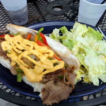 Mayslack's - Philly Cheesesteak (sautéed onions, peppers & melted Cheese Whiz on a hoagie bun, $10.95) side caesar - Bars Near Me - Minneapolis, Minnesota Mayslack's - Philly Cheesesteak (sautéed onions, peppers & melted Cheese Whiz on a hoagie bun, $10.95) side caesar - Bars Near Me - Minneapolis, Minnesota