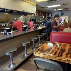 Neighbors Cafe - Narrow, and full of people.