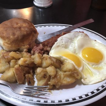 Melanie's Restaurant - Corn Beef Hash with eggs and biscuit - Burgers Near Me - Williston, Florida