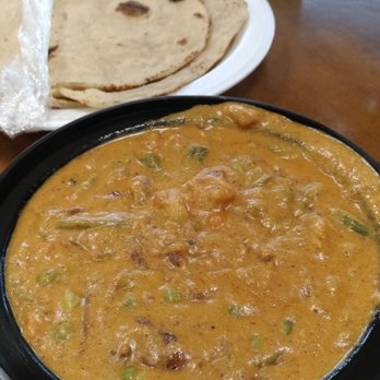 WeDeshi Foods - Vegetable Korma with chapatti in the background - Indian Near Me - Toronto, Ontario WeDeshi Foods - Vegetable Korma with chapatti in the background - Indian Near Me - Toronto, Ontario