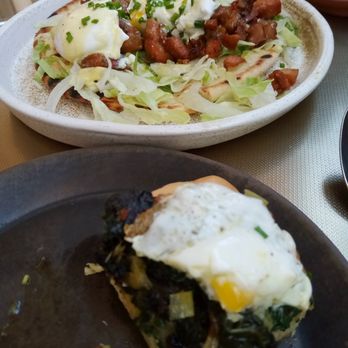 Krasi - Part of a peinirli (front) and gyro benedict (back) - Mediterranean Near Me - Boston, Massachusetts