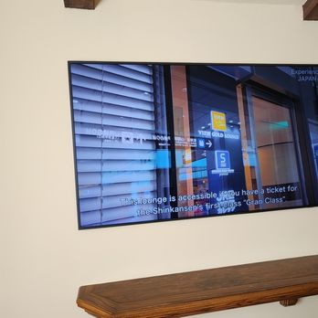 DataPhone - Samsung Frame Tv  on Kitchen nook wall.
Brain box, wires, power concealed behind TV/drywall - Security Systems Near Me - Glendale, California