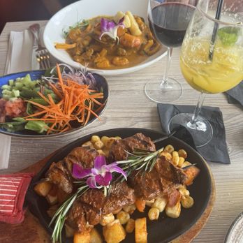 Aromas del Peru - Corvina A lo macho, Anticuchos, Maracuya drink and wine - Peruvian Near Me - Miami, Florida Aromas del Peru - Corvina A lo macho, Anticuchos, Maracuya drink and wine - Peruvian Near Me - Miami, Florida