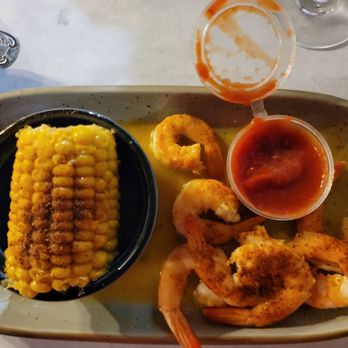 Mr. Shuck's Seafood - Basket of garlic shrimp with garlic corn - Seafood Near Me - Brunswick, Georgia Mr. Shuck's Seafood - Basket of garlic shrimp with garlic corn - Seafood Near Me - Brunswick, Georgia