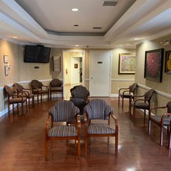William P Toole, MD - Toole Sports Medicine - Physician waiting room with television. Patient check in area (check in is done on an iPad!).