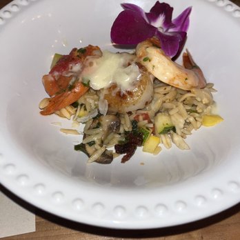 Cork Soakers Deck and Wine Bar - Shrimp and scallop over orzo pasta with spring vegetables - Wine Bars Near Me - Cape Coral, Florida Cork Soakers Deck and Wine Bar - Shrimp and scallop over orzo pasta with spring vegetables - Wine Bars Near Me - Cape Coral, Florida