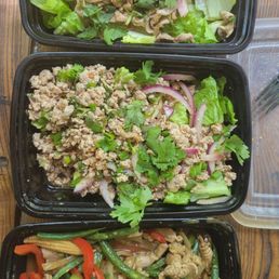Waterfall salad with pork, larb salad with pork and pork with thai basil sauce. Waterfall salad with pork, larb salad with pork and pork with thai basil sauce.