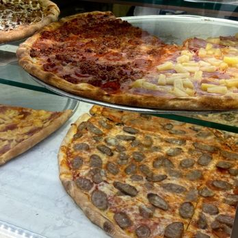 Koronet Pizza - The second shelf is the regular sizes. The bottom shelf is the larger one. - Pizza Near Me - New York, New York Koronet Pizza - The second shelf is the regular sizes. The bottom shelf is the larger one. - Pizza Near Me - New York, New York
