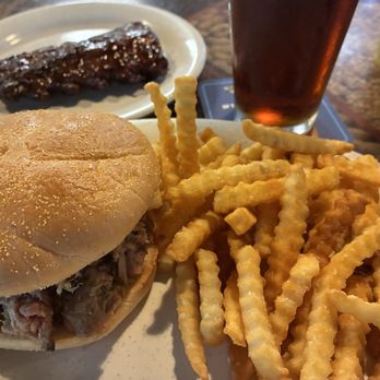 Woody's Bar-B-Q - Carolina Pulled Pork Sandwich and half a slab of Baby Back Ribs - Barbeque Near Me - Jacksonville, Florida Woody's Bar-B-Q - Carolina Pulled Pork Sandwich and half a slab of Baby Back Ribs - Barbeque Near Me - Jacksonville, Florida