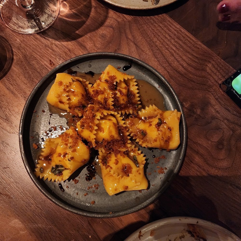 Bar 56 - Seasonal ravioli with parsnips and robiolo cheese, with a browned butter and aged balsamic sauce - New American Near Me - Brooklyn, New York