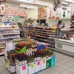 The Corner Deli - Interior with the deli counter in the back