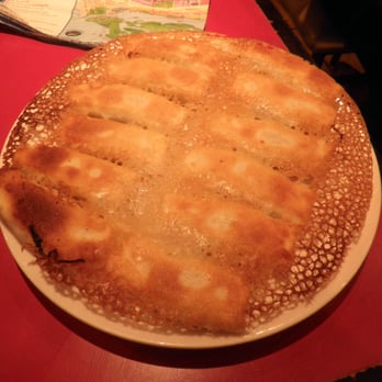 Dumpling House Restaurant - Crispy on the bottom, perfectly steamed on the top. (Properly served up-side down as seen in the photo.) - Chinese Near Me - Toronto, Ontario Dumpling House Restaurant - Crispy on the bottom, perfectly steamed on the top. (Properly served up-side down as seen in the photo.) - Chinese Near Me - Toronto, Ontario