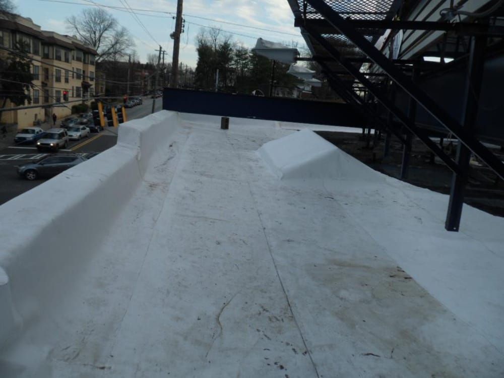 Slide of Astro Roofing Repairs