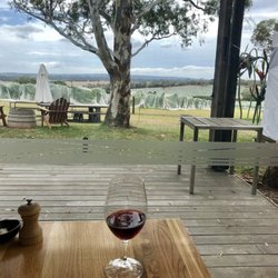 Yabby Lake Vineyard - a glass of pinot noir overlooking the vineyard