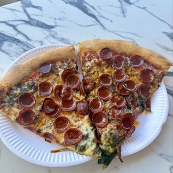 Rozzi Pizza - Two glorious slices of the West Side slice. Tomato/pesto pepperoni, cheese and hot honey. - Pizza Near Me - Santa Barbara, California Rozzi Pizza - Two glorious slices of the West Side slice. Tomato/pesto pepperoni, cheese and hot honey. - Pizza Near Me - Santa Barbara, California