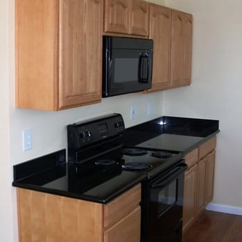 Restored Kitchen With Complete Black Appliances Package True