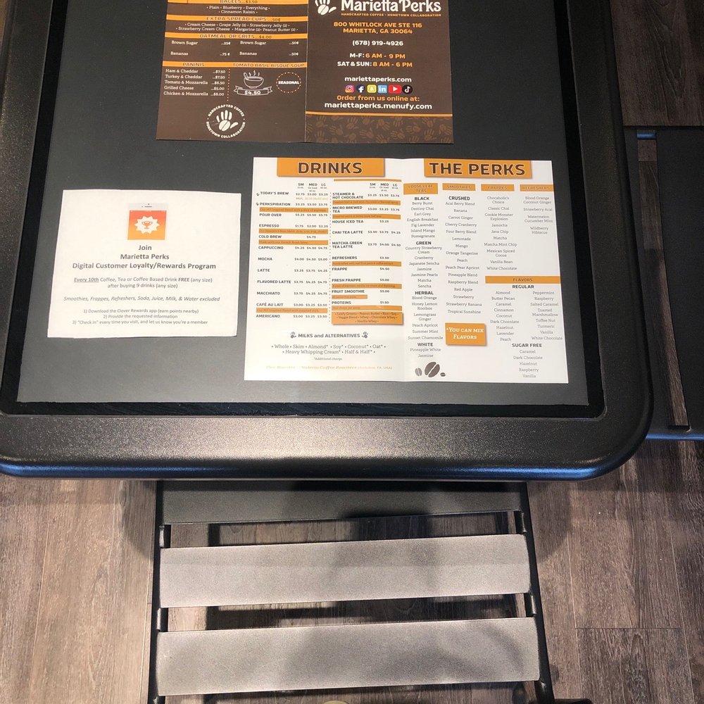 Marietta Perks - All tables have menus under glass. Love that!! - Coffee & Tea Near Me - Marietta, Georgia Marietta Perks - All tables have menus under glass. Love that!! - Coffee & Tea Near Me - Marietta, Georgia