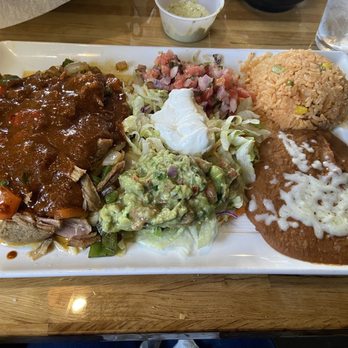 Tequilas D Oro - Cheese enchiladas plate topped with pork. ( lunch portion ) - Mexican Near Me - Jacksonville, Florida Tequilas D Oro - Cheese enchiladas plate topped with pork. ( lunch portion ) - Mexican Near Me - Jacksonville, Florida