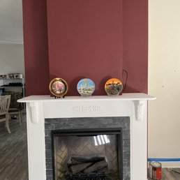Finished product after installing upgraded fireplace and installing stone tile.